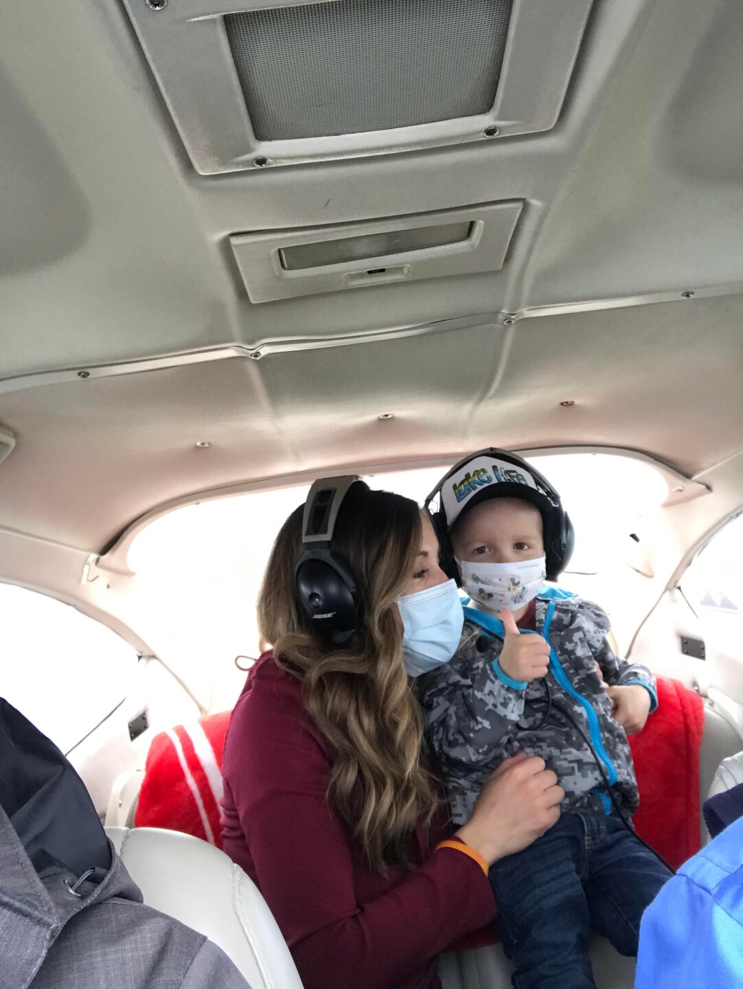 Ashlee and Tristan Voller on an Angel Flight West volunteer's plane