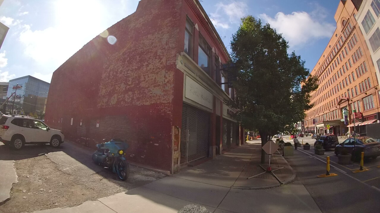 Bedrock's garage plans call for demolishing this two-story building at 620 Prospect Ave. A jazz and blues club once occupied the second floor.