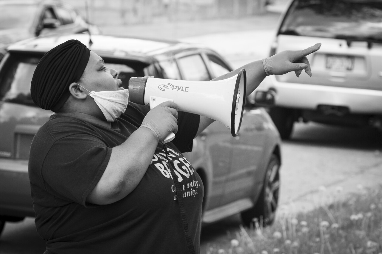 Melody McCurtis instructing volunteers during a neighborhood visit Photo Credit: Dan Herda, United Way