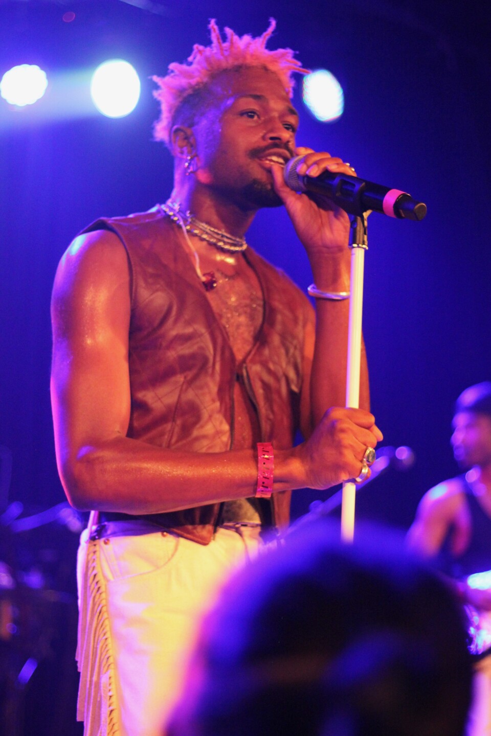 Duckwrth on stage performing