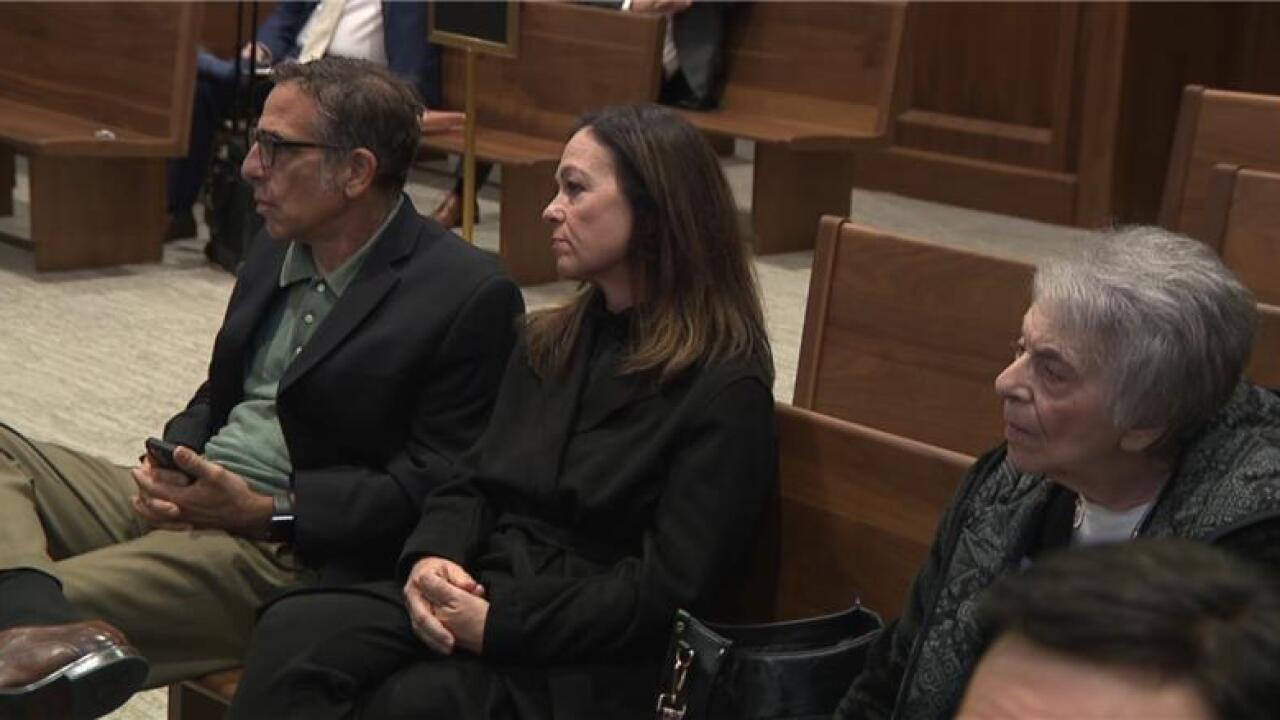 The Schindlers listen to their attorney argue for the unsealing of guardianship records