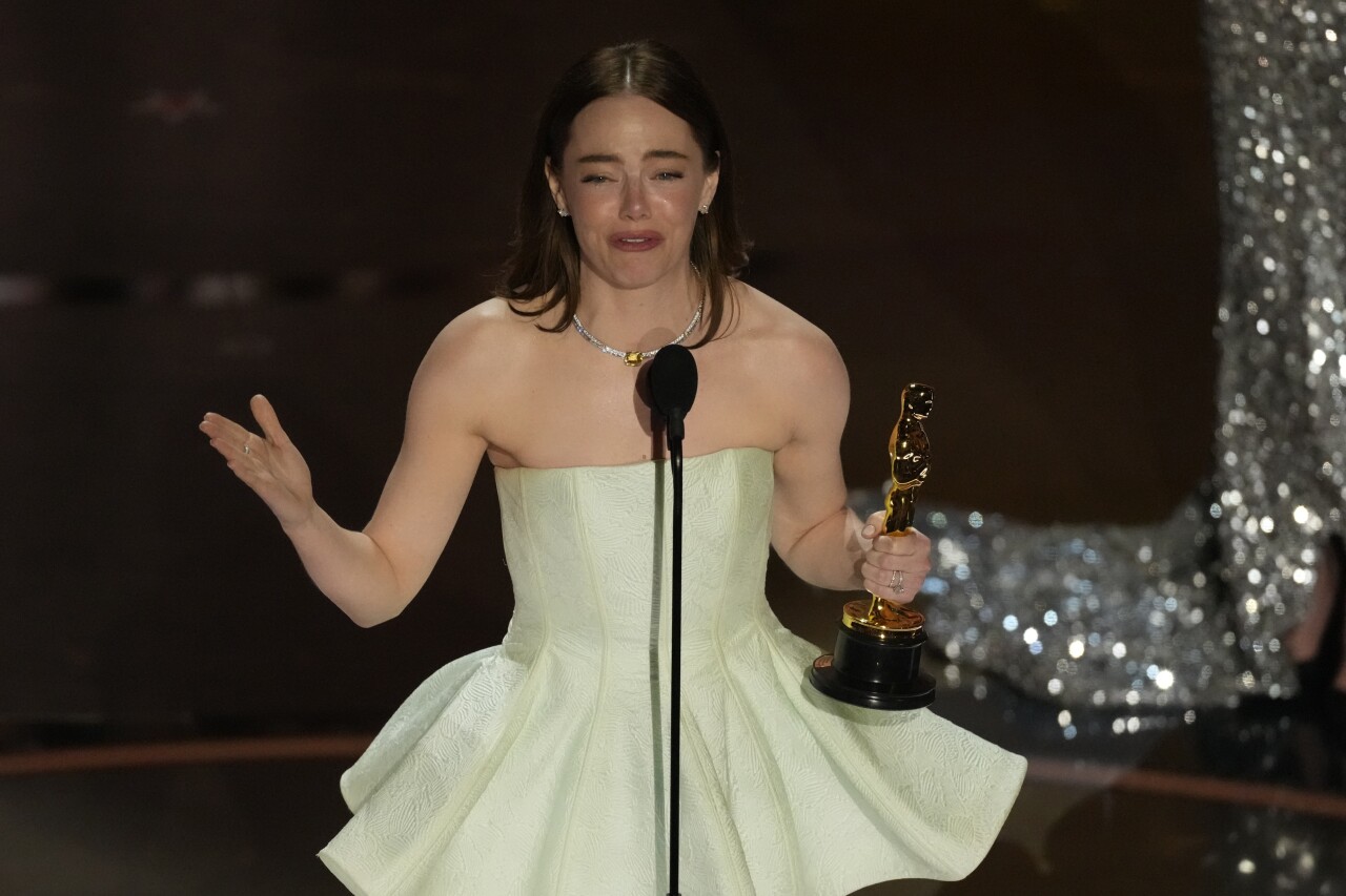 Emma Stone in tears while holding Oscar for best actress for 'Poor Things,' March 10, 2024