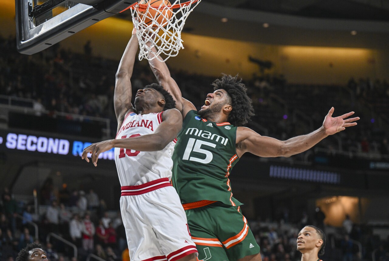 Miami Hurricanes forward Norchad Omier blocks shot by Indiana Hoosiers forward Kaleb Banks in second half of second-round NCAA tournament game, March 19, 2023