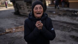 Tanya Nedashkivs'ka, 57, mourns the death of her husband who was killed in Bucha, on the outskirts of Kyiv, Ukraine, Monday, April 4, 2022.