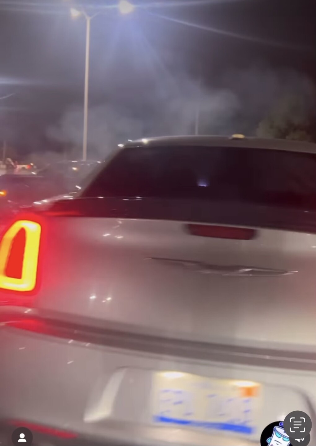 Chrysler 300 mi plate doing donuts.jpg