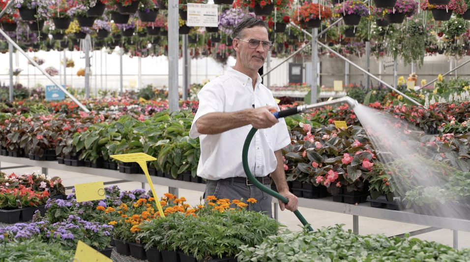 JOEL WATERING PLANTS.