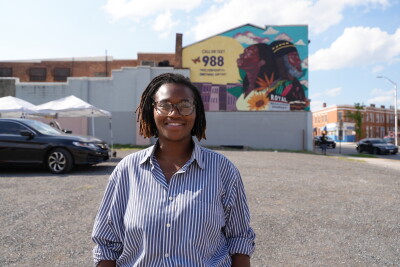 Yewande Kotun Davis and her mural on Pennsylvania Ave