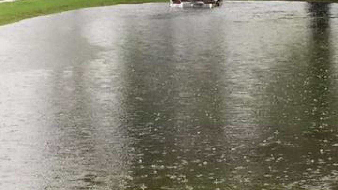 PHOTOS | Tropical system causing flooding