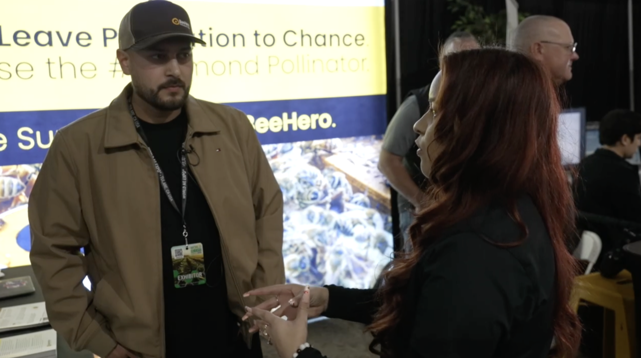 Neighborhood Reporter Ruby Rivera interviewing Daniel Teran, Field Marketing Manager for BeeHero