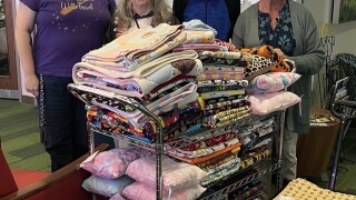Fleming County Homemakers donates more than 60 quilted blankets for Shriner's Children's Hospital patients