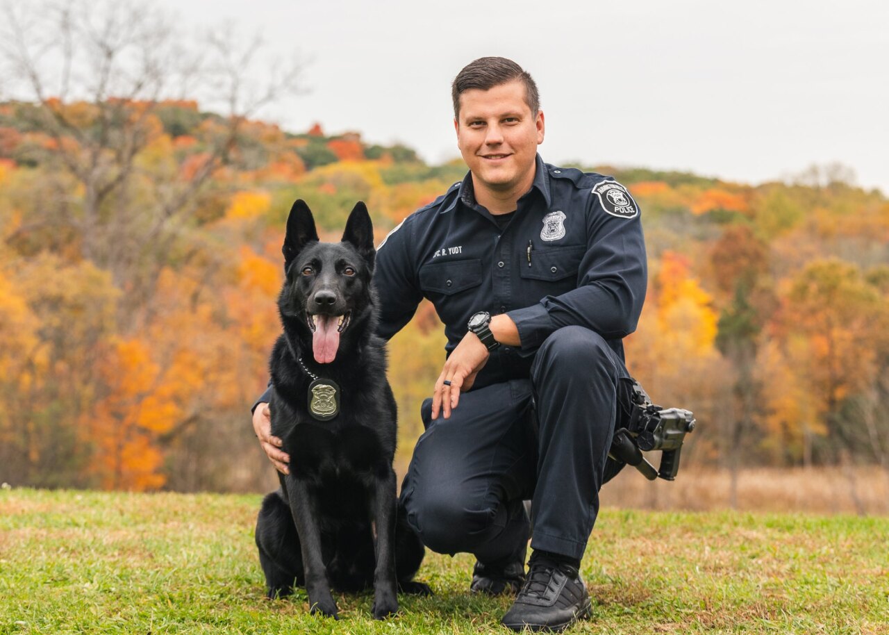 Farmington Hills police Officer Ryan Yudt and K9 Dozer