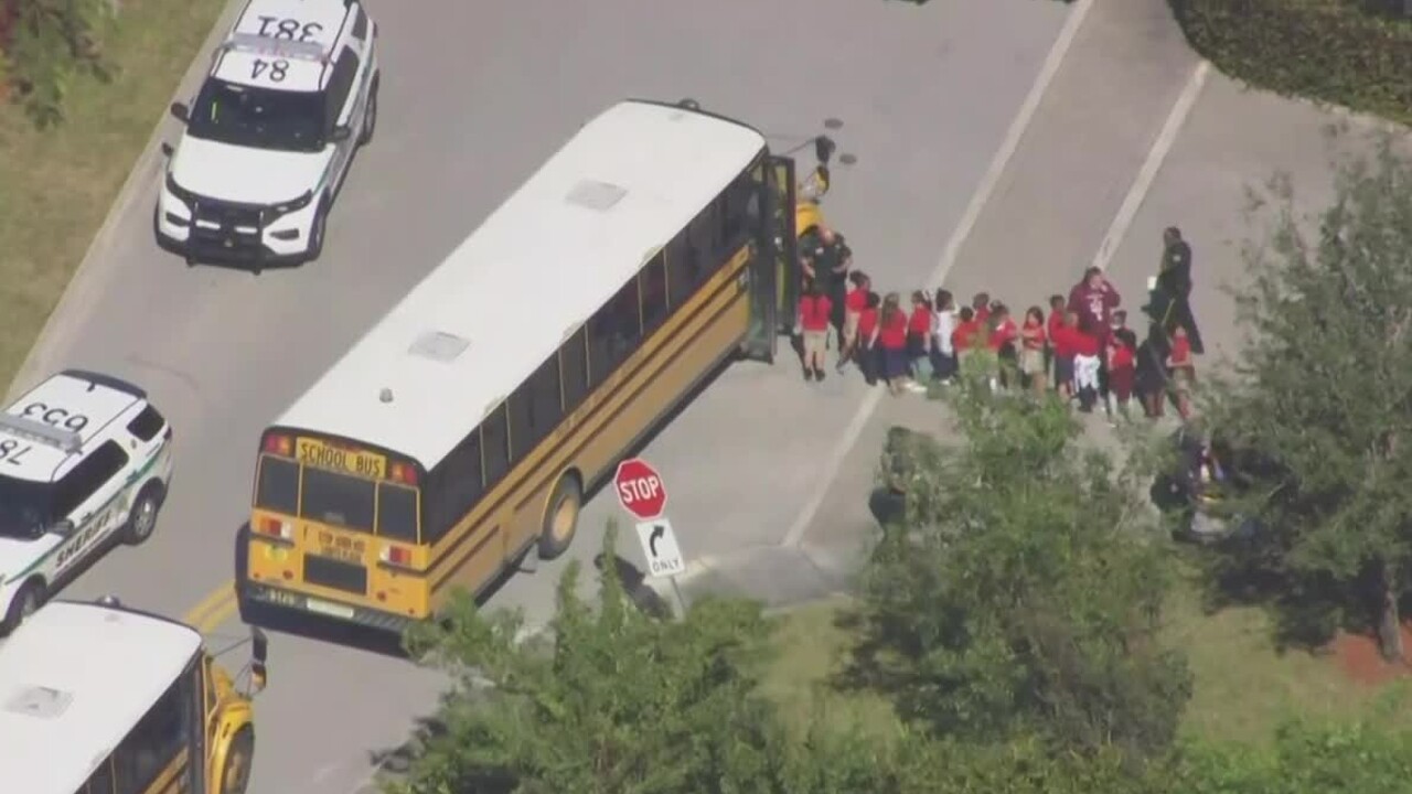 Students are evacuated from Renaissance Charter School, located in the 3200 block of U.S. 441 in Wellington, on Feb. 3, 2022 (1).jpg