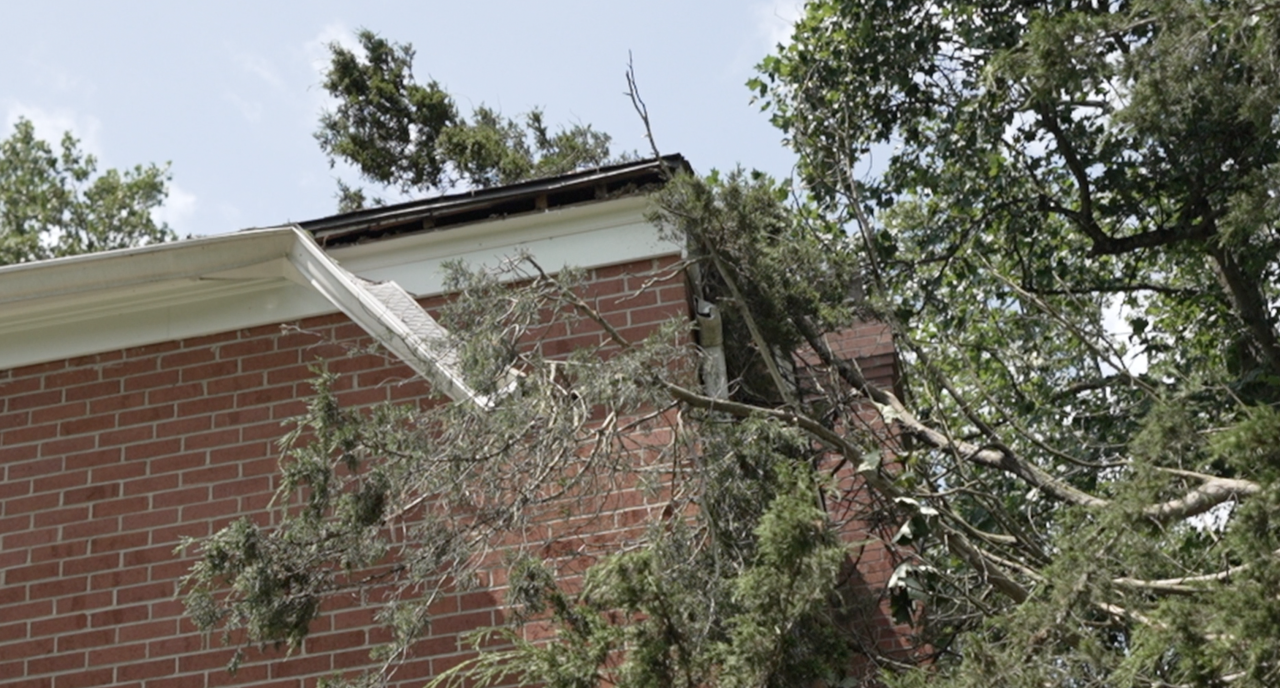 Damaged gutters atop Richard Fowler's home