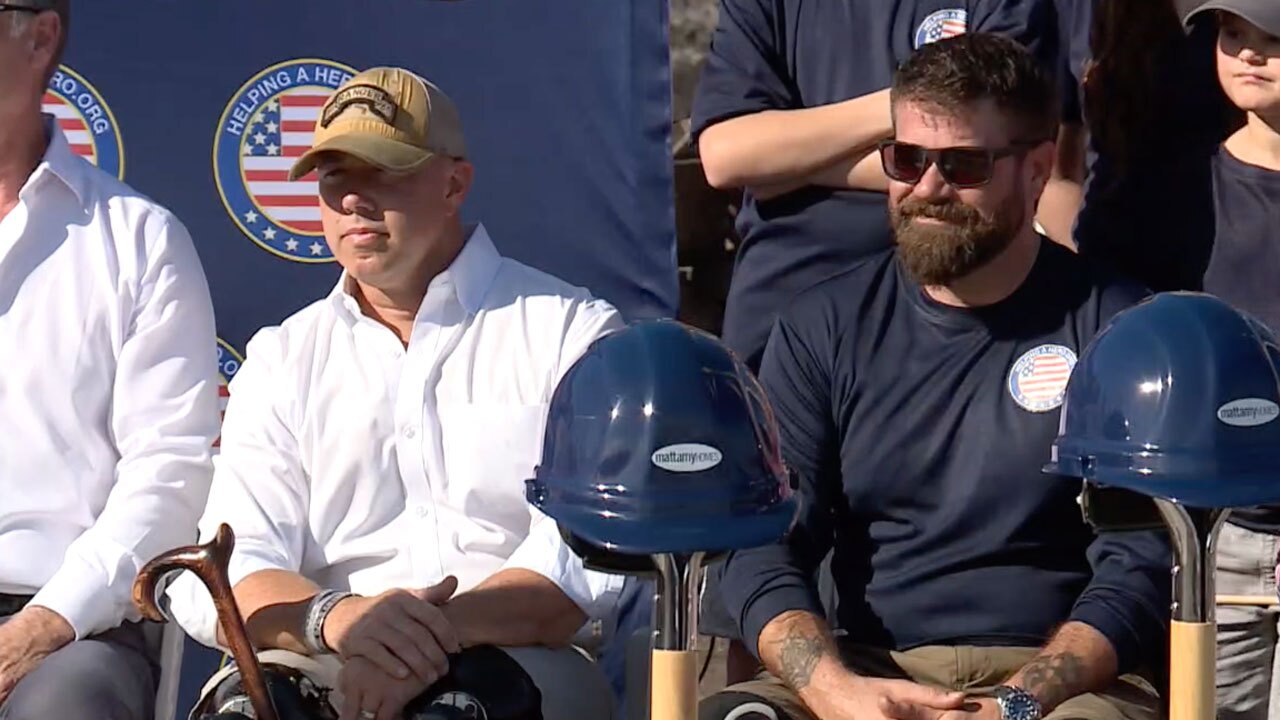 U.S. Rep. Brian Mast and retired Marine Sgt. Christian Fleming at groundbreaking ceremony for new home, Dec. 13, 2021