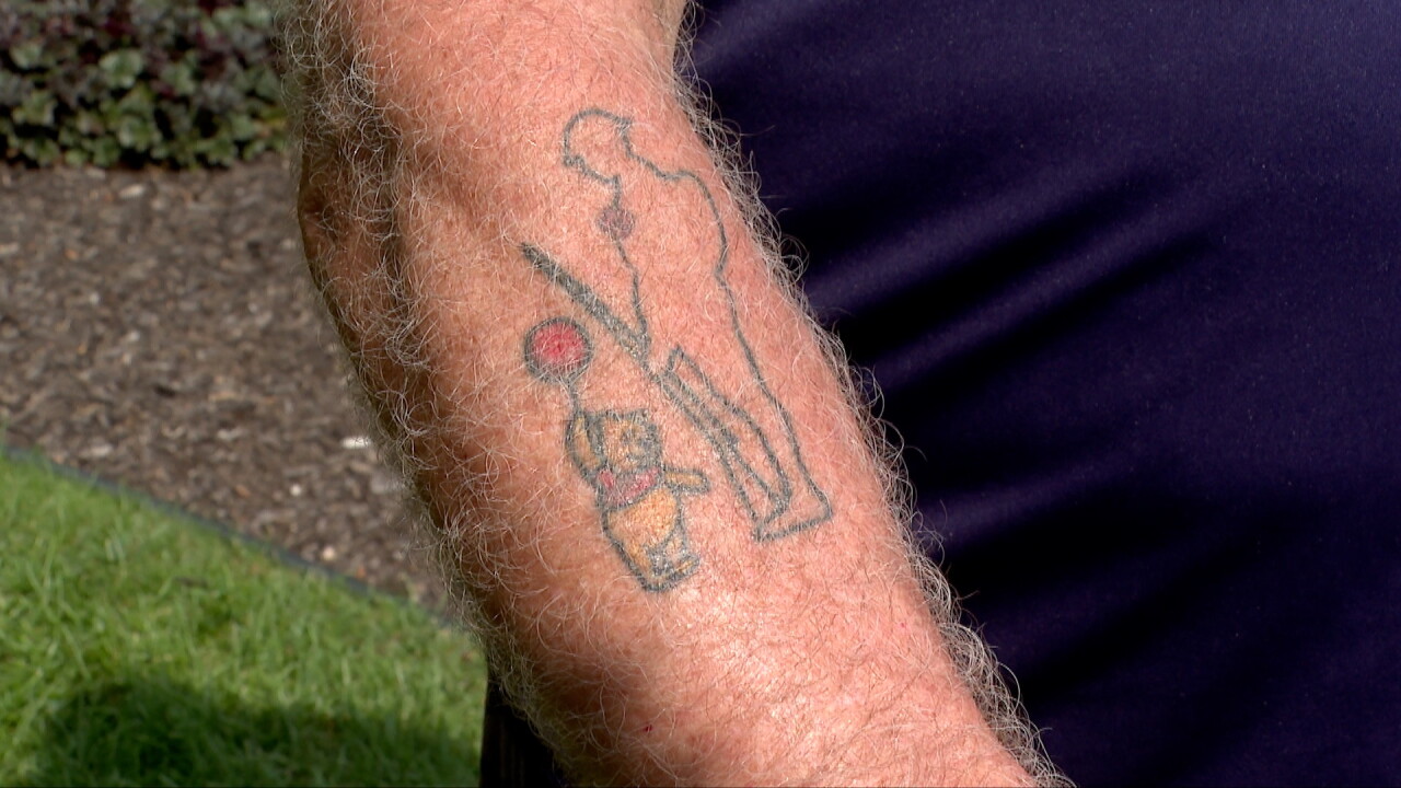 ryan yantis pooh tattoo.jpg