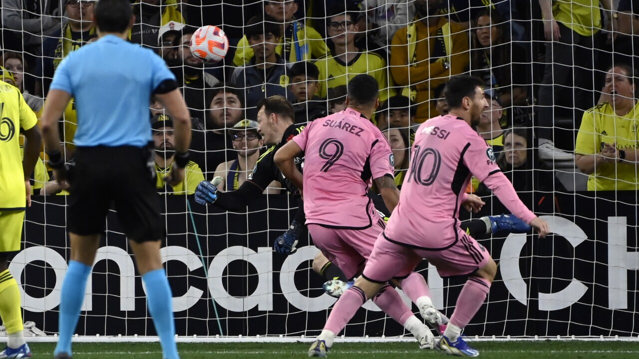 Lionel Messi and Luis Suarez