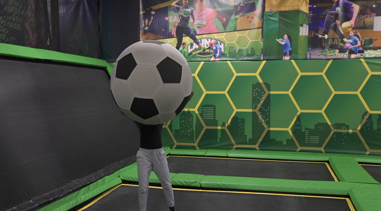 Giant soccer ball inside of Launch Trampoline Park