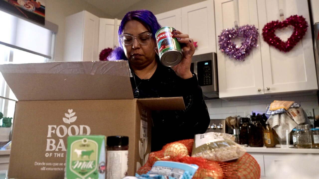 Tafoya shows grocery box.jpg