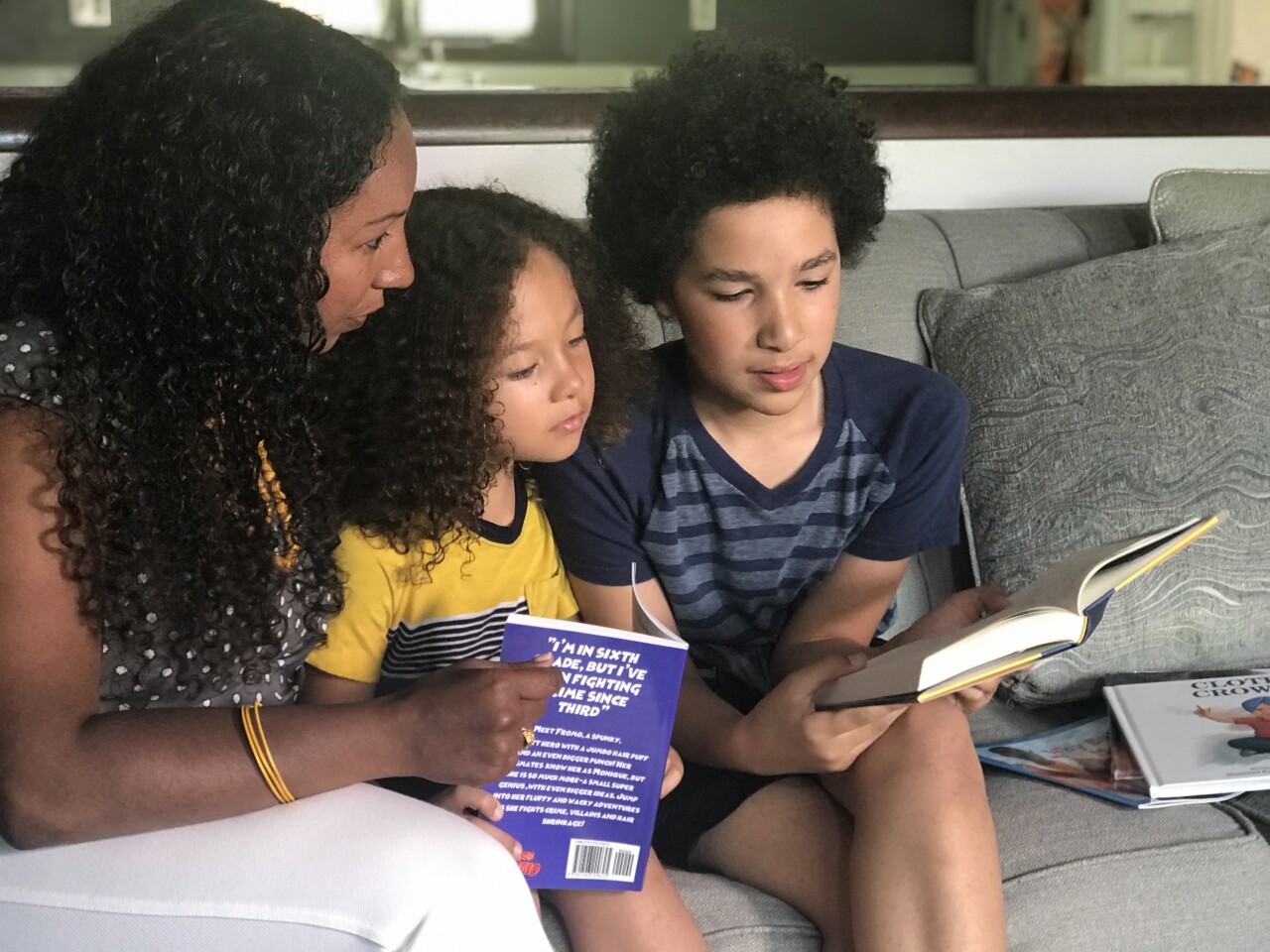 Deanna, Zion and Zephaniah reading