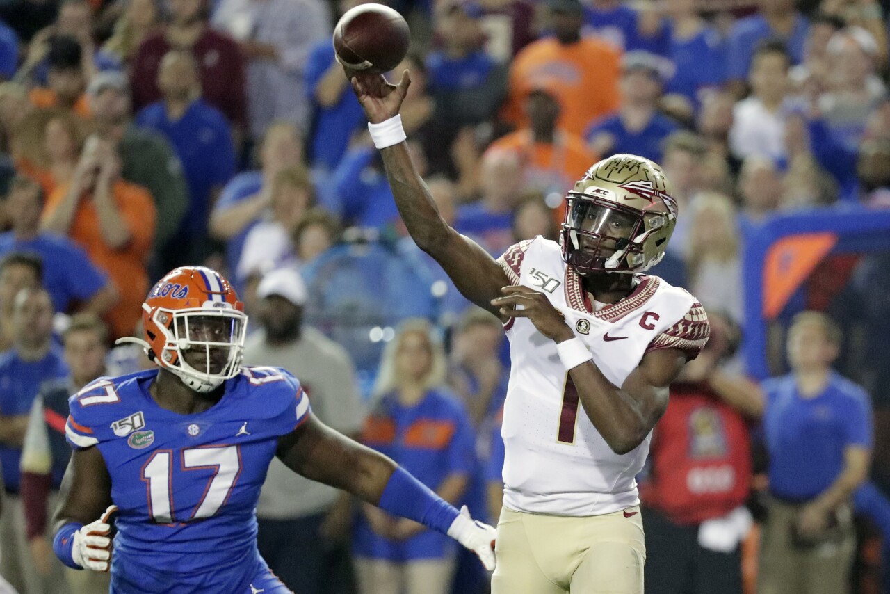 Florida State Seminoles QB James Blackman throws vs Florida Gators in 2019