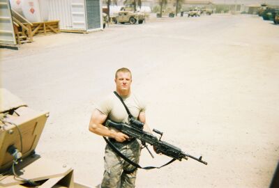 Casey Alexander serving as an Army Sniper