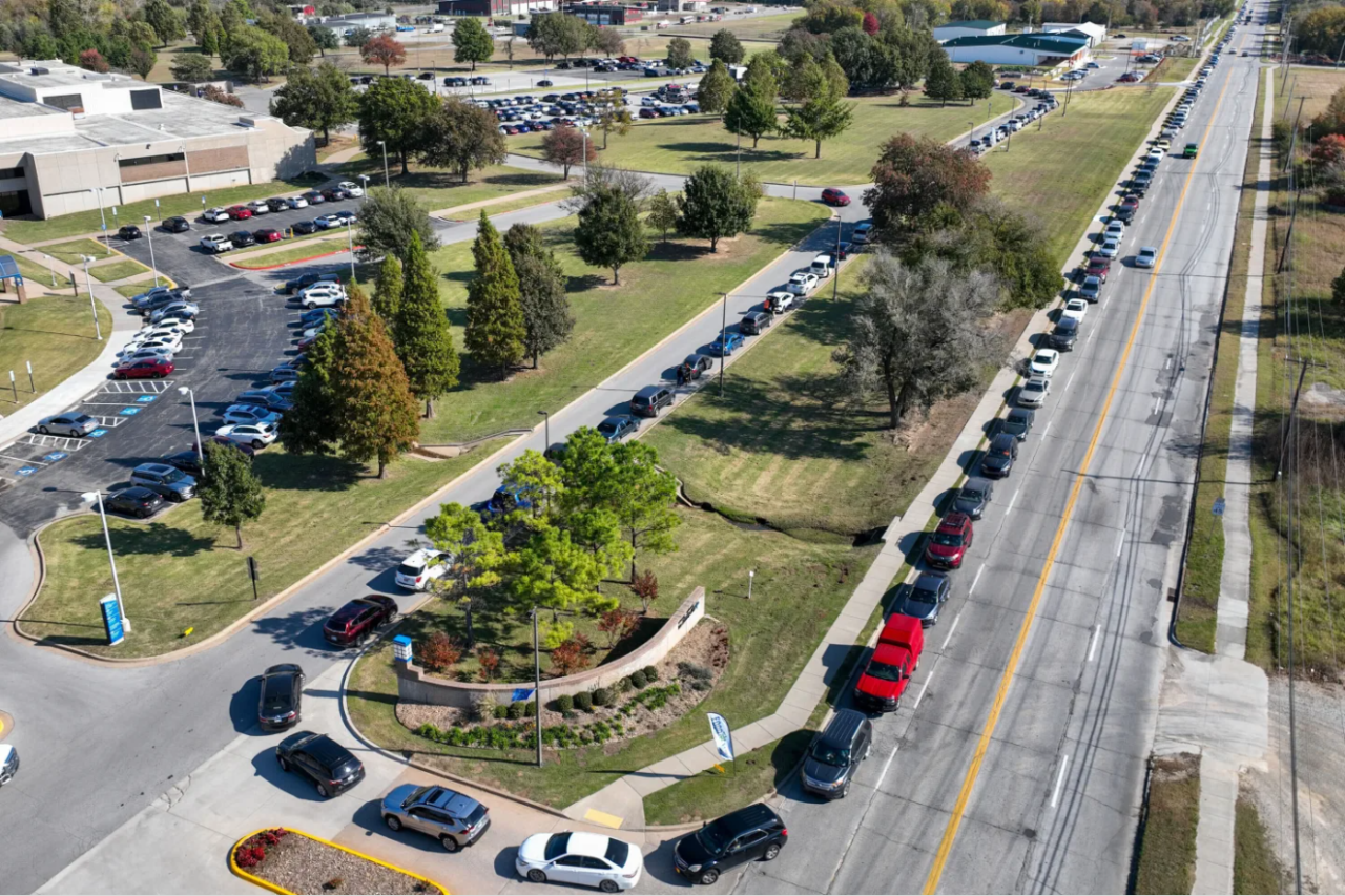Cars line up for a pop-up food distribution event to provide extra support for Tulsa families affected by the recent lapse in SNAP benefits, at Food on the Move in Tulsa, Okla., on Thursday, Nov. 6, 2025.