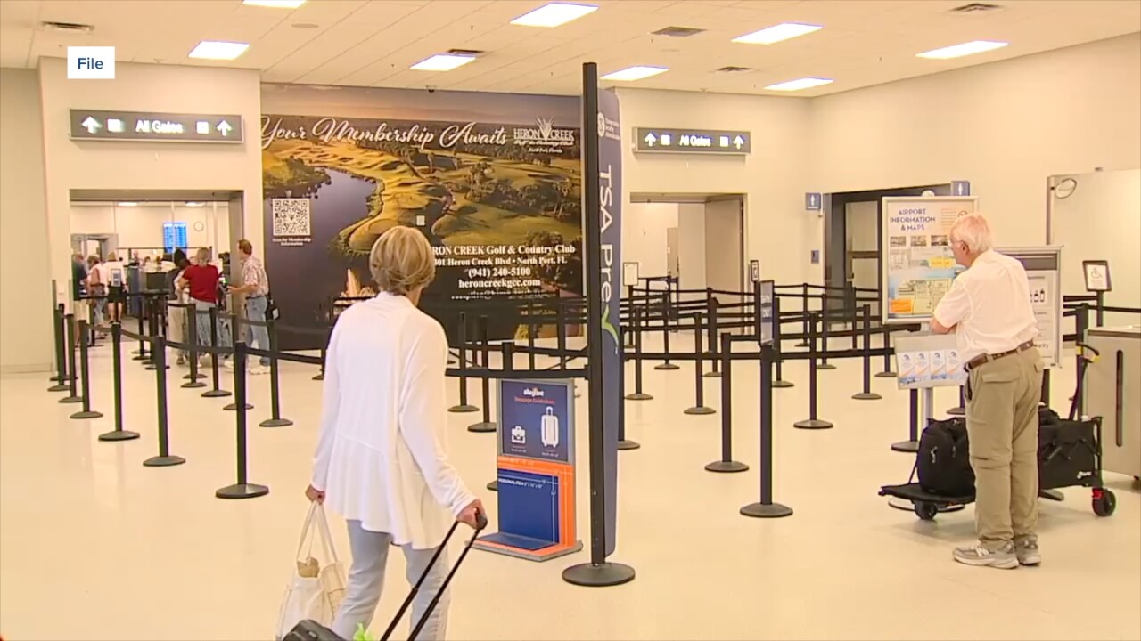 Travelers going through the Punta Gorda airport.