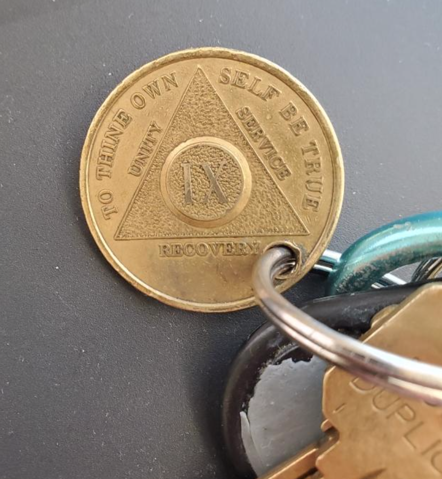 Travis' 9-year sobriety coin
