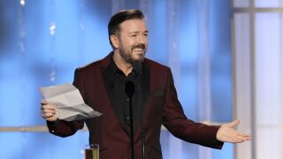 In this handout photo provided by NBC, host Ricky Gervais performs onstage during the 69th annual Golden Globe Awards at the Beverly Hilton International Ballroom on Jan. 15, 2012, in Beverly Hills, California.