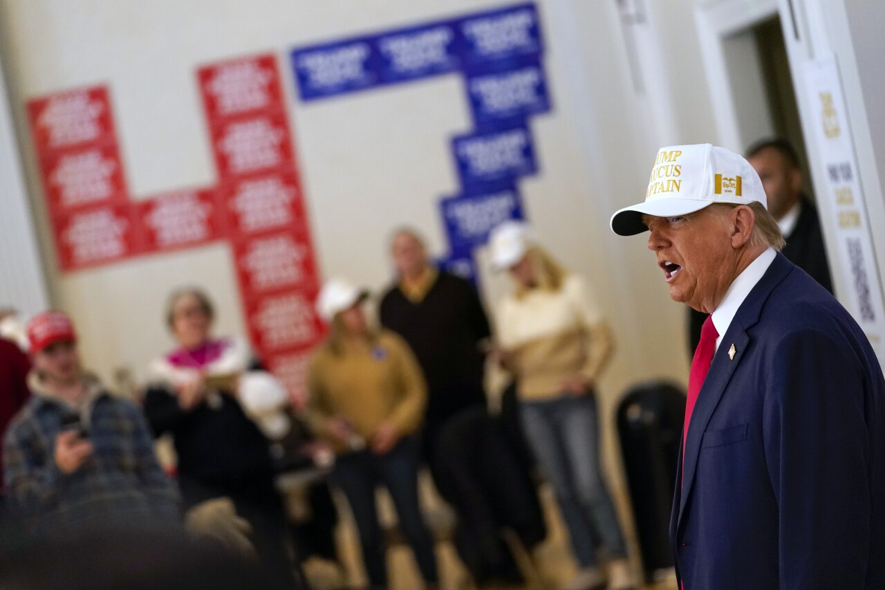 Former President Donald Trump speaks to volunteers at Hotel Fort Des Moines in Des Moines, Iowa, on Sunday.