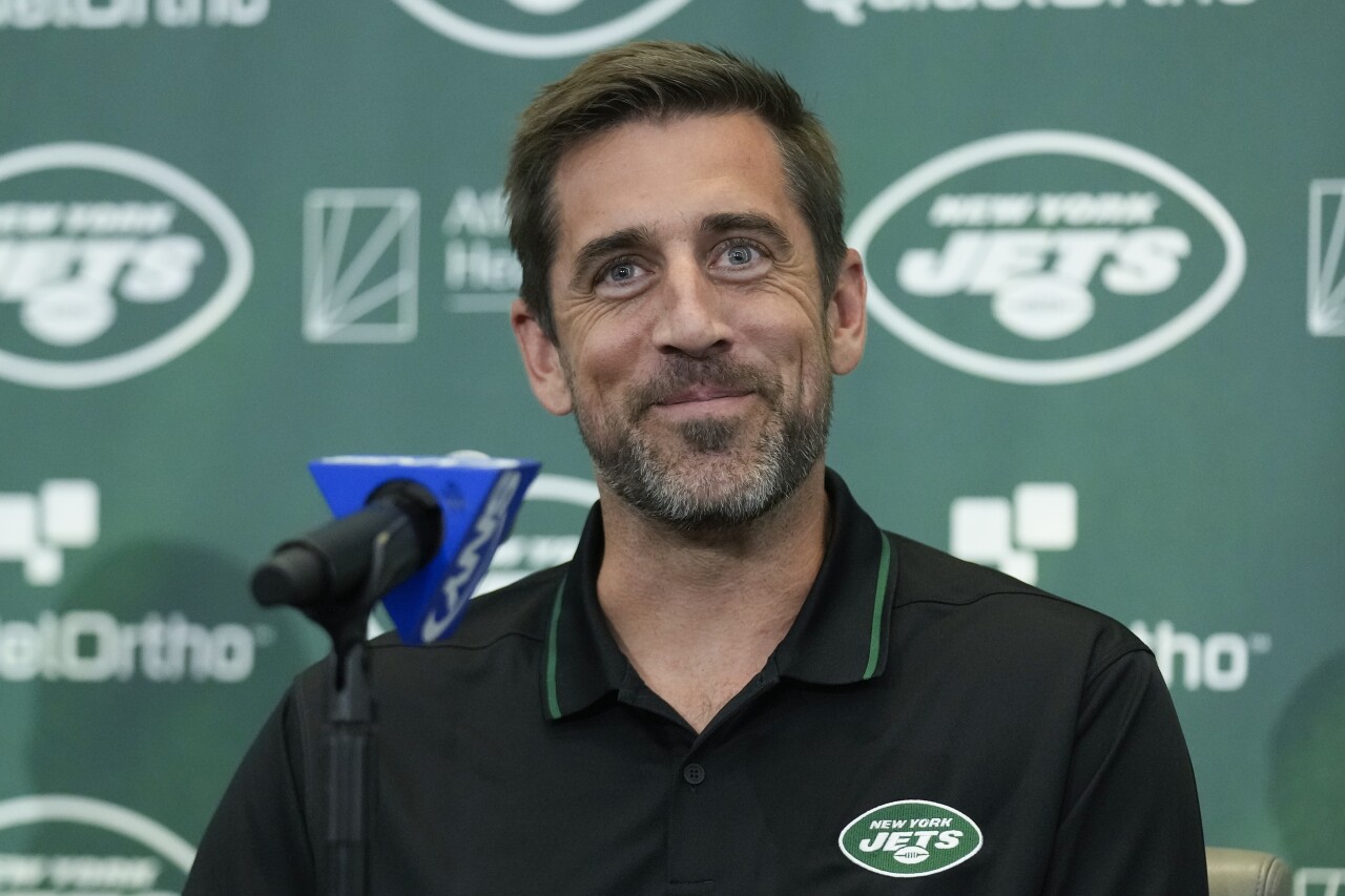 New York Jets QB Aaron Rodgers smiles at introductory news conference, April 26, 2023