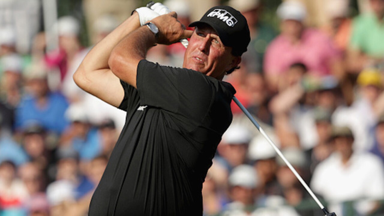 Video: Phil Mickelson hits shot onto road