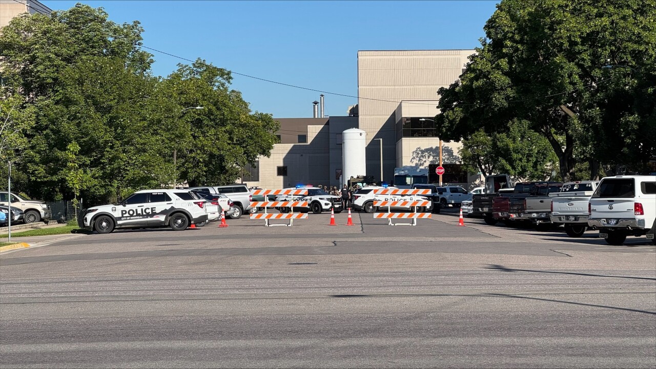 Large law enforcement presence near Orange Street and Pine Street