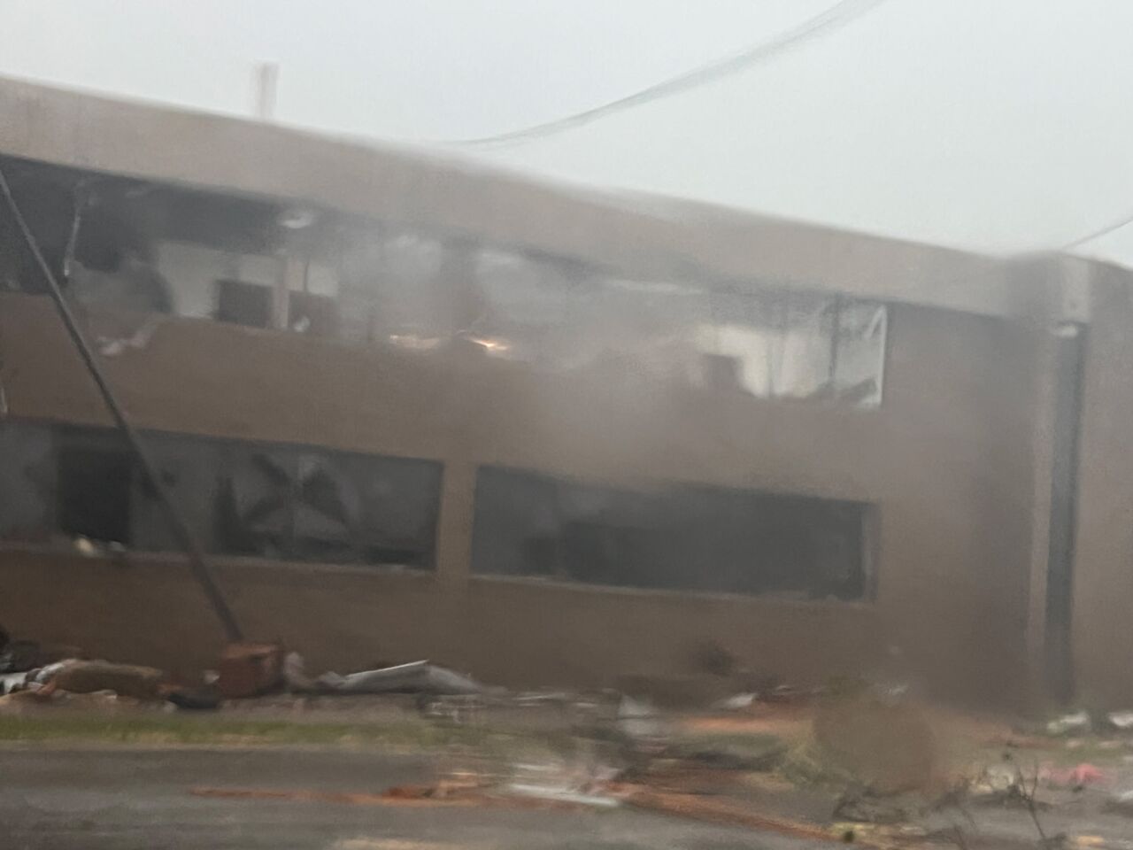 Strong winds damaged an office building on Fourth Street in Menasha Monday afternoon 
