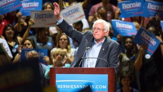 U.S. Sen. Bernie Sanders (I-VT) speaks to the crowd at the Phoenix Convention Center July 18, 2015 in Phoenix, Arizona. The Democratic presidential candidate spoke on his central issues of income inequality, job creation, controlling climate change, quality affordable education and getting big money out of politics, to more than 11,000 people attending.
