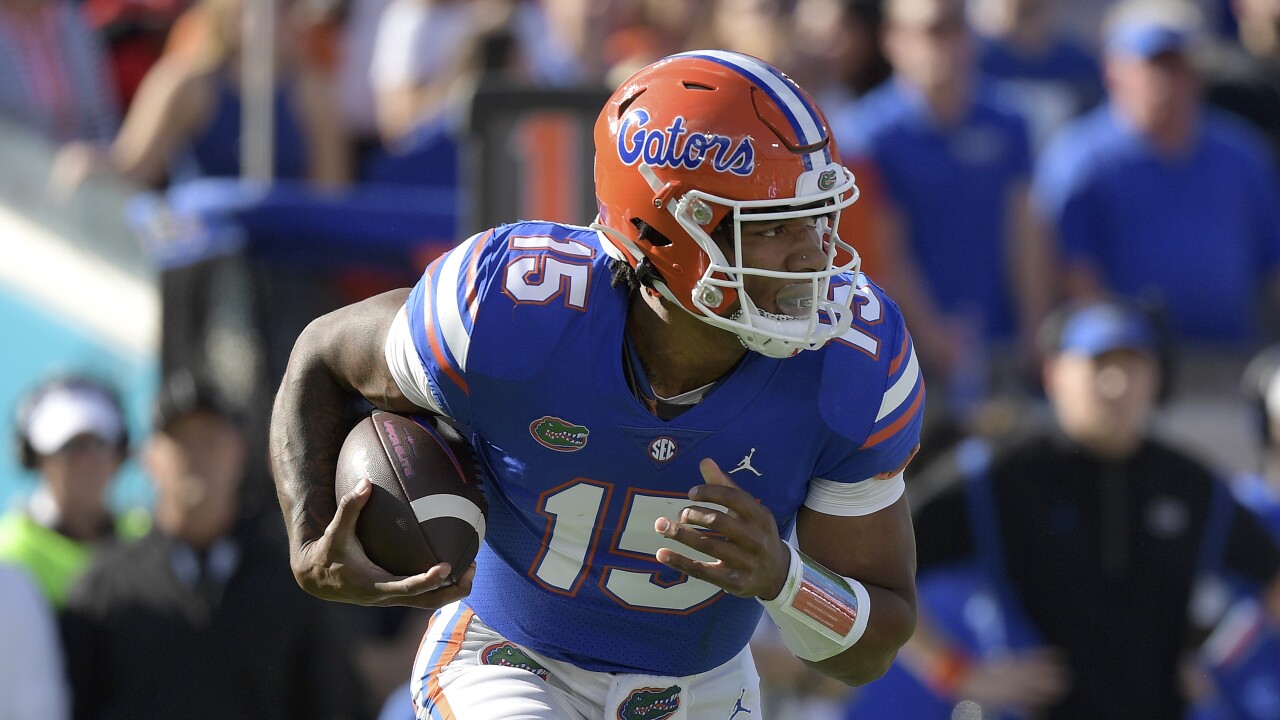 Florida Gators QB Anthony Richardson scrambles for yardage vs. Georgia Bulldogs in 2021