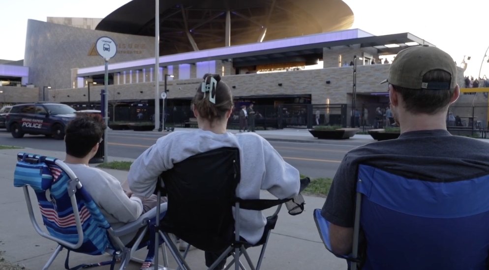 FANS SIT OUTSIDE ACRISURE