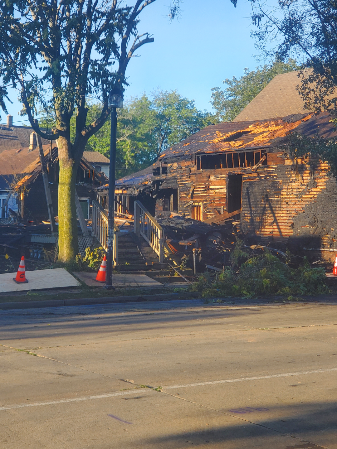 Porch damaged by arson of vacant home.