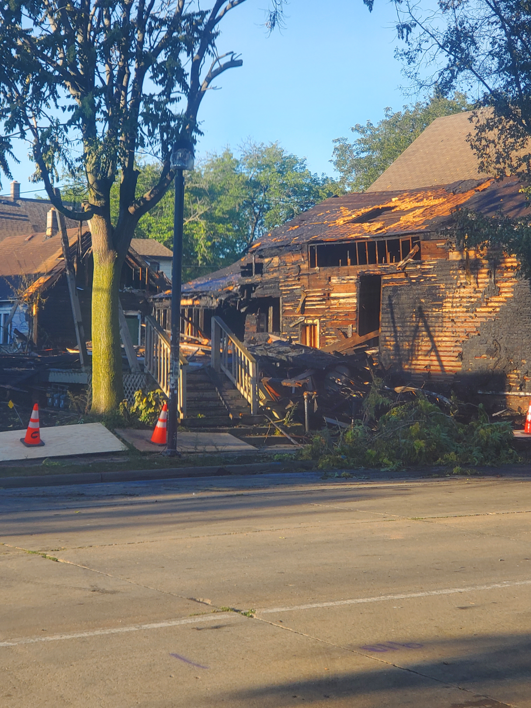 Porch damaged by arson of vacant home. 