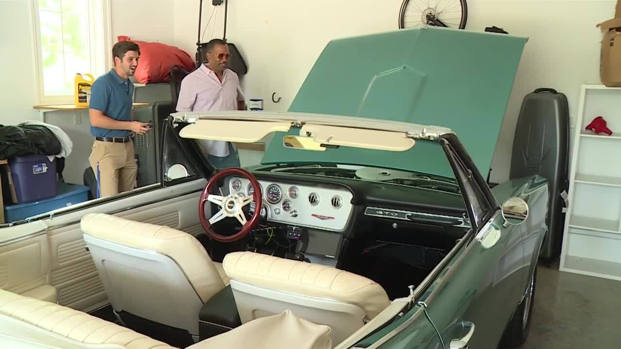 Reporter Tyler Layne, Dana Smith and the "GOAT."