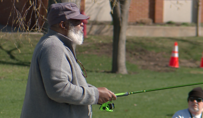 Fishermen enjoy a quiet morning near Green Lake