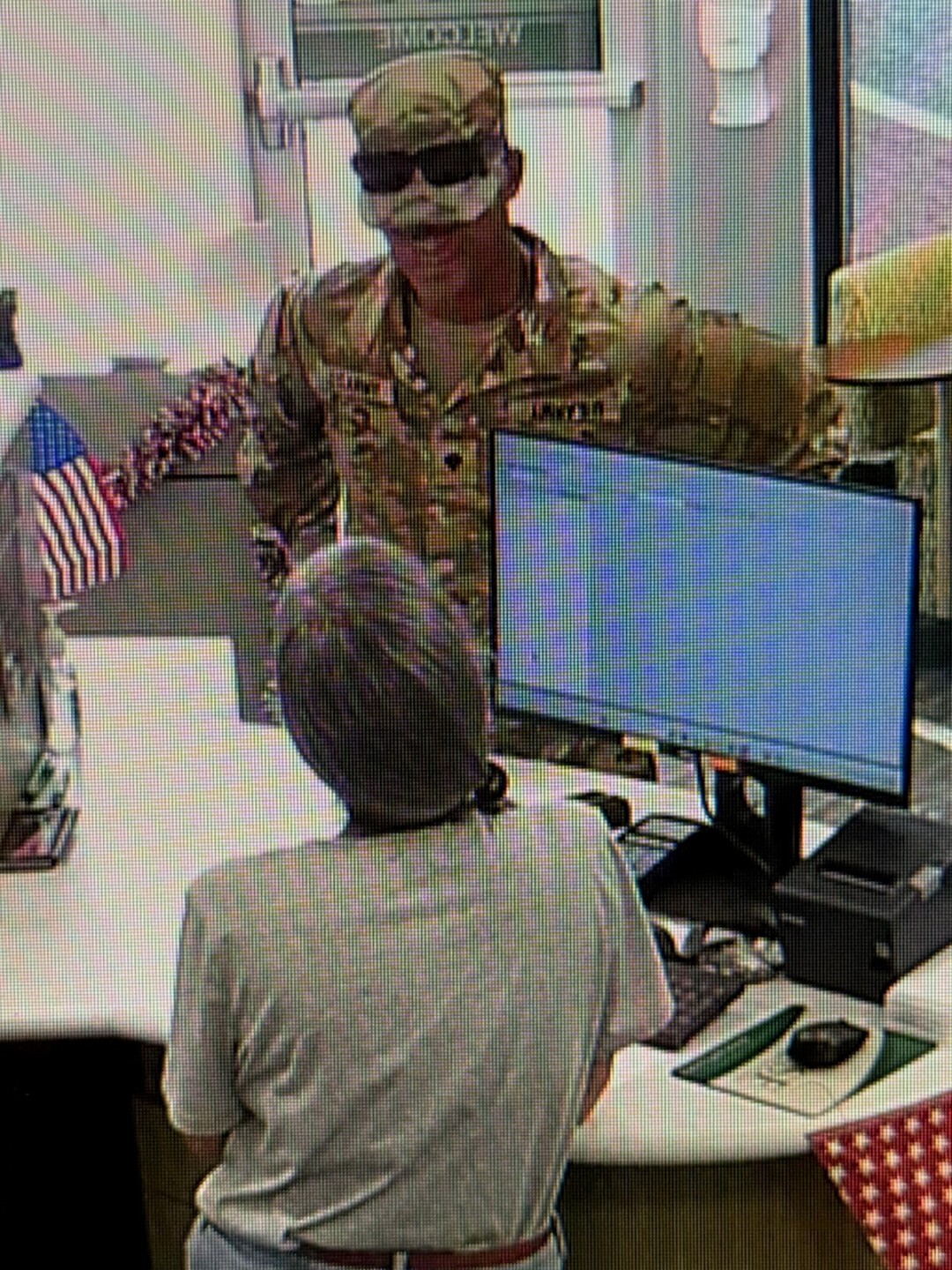 Man robs bank in army uniform