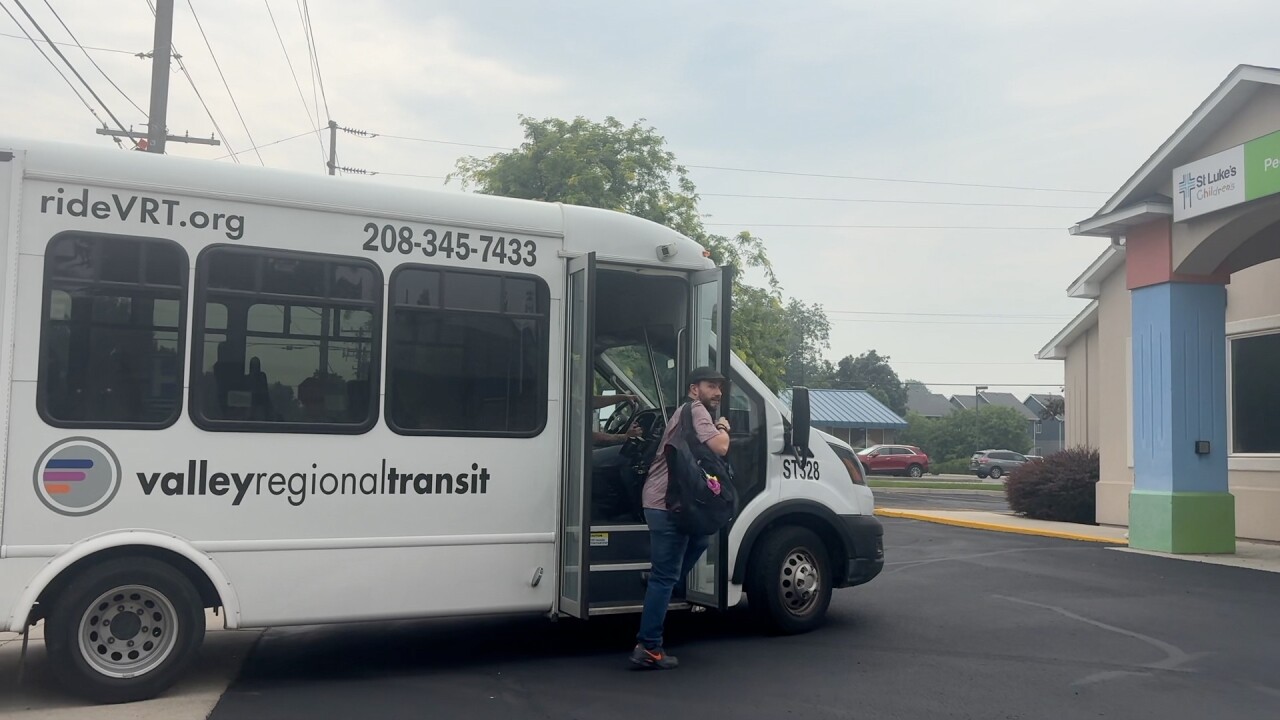 Valley Regional Transit rider getting off on-demand bus