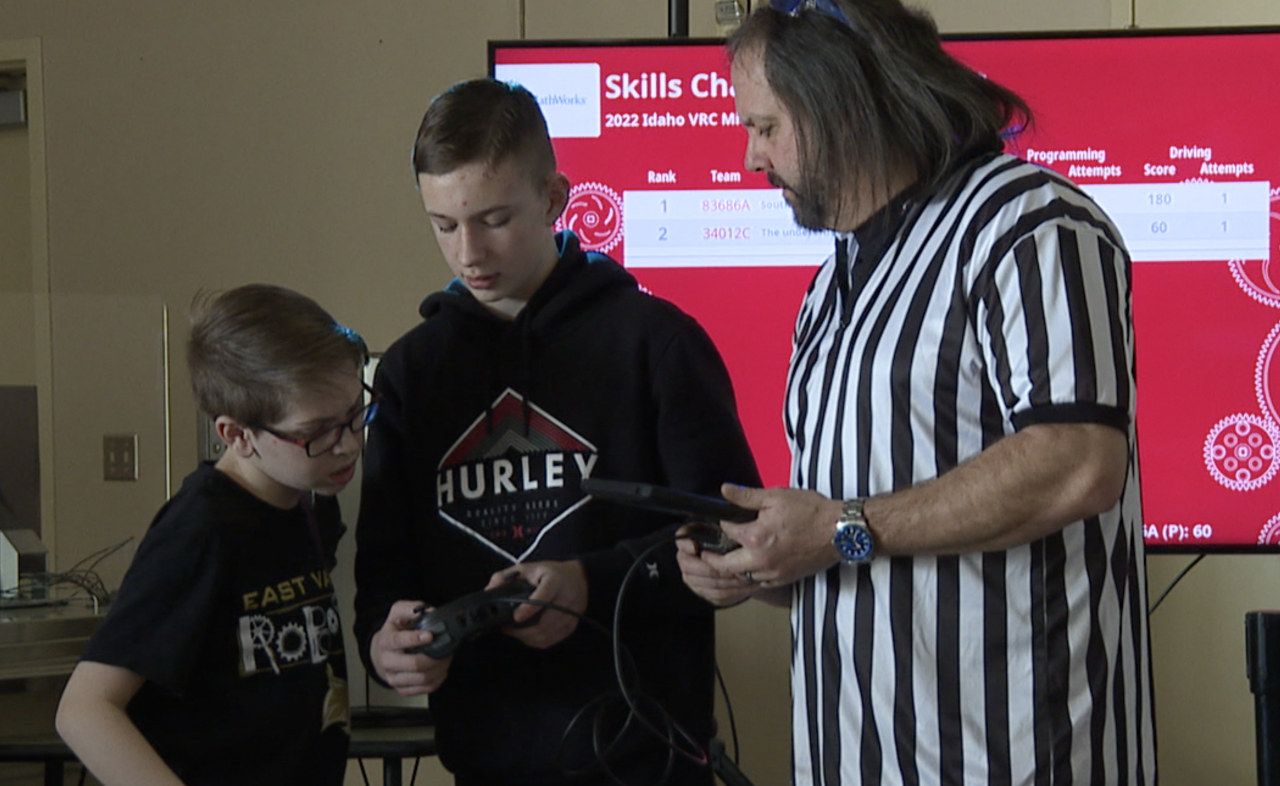 Landon Hammer, center, collaborates with a team mate during the skills competition on Friday.