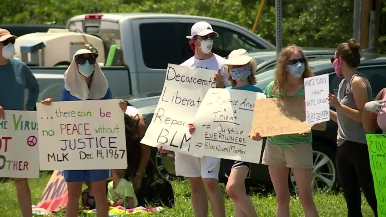 A group of protesters gathered in Indian River County on Sunday across from the Indian River County Sheriff's Office facility.