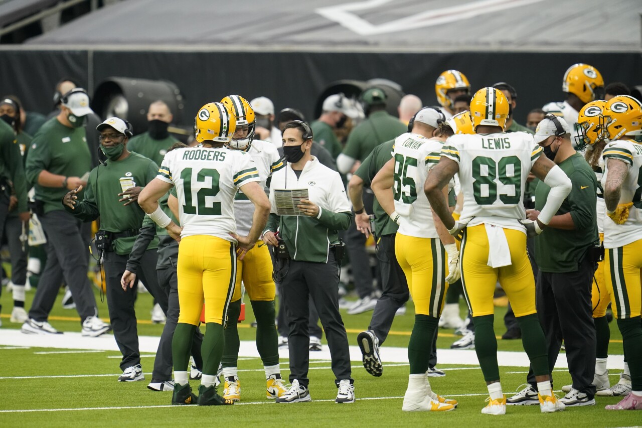 Green Bay Packers head coach Matt LaFleur speaks to QB Aaron Rodgers and team during timeout at Houston Texans in 2020