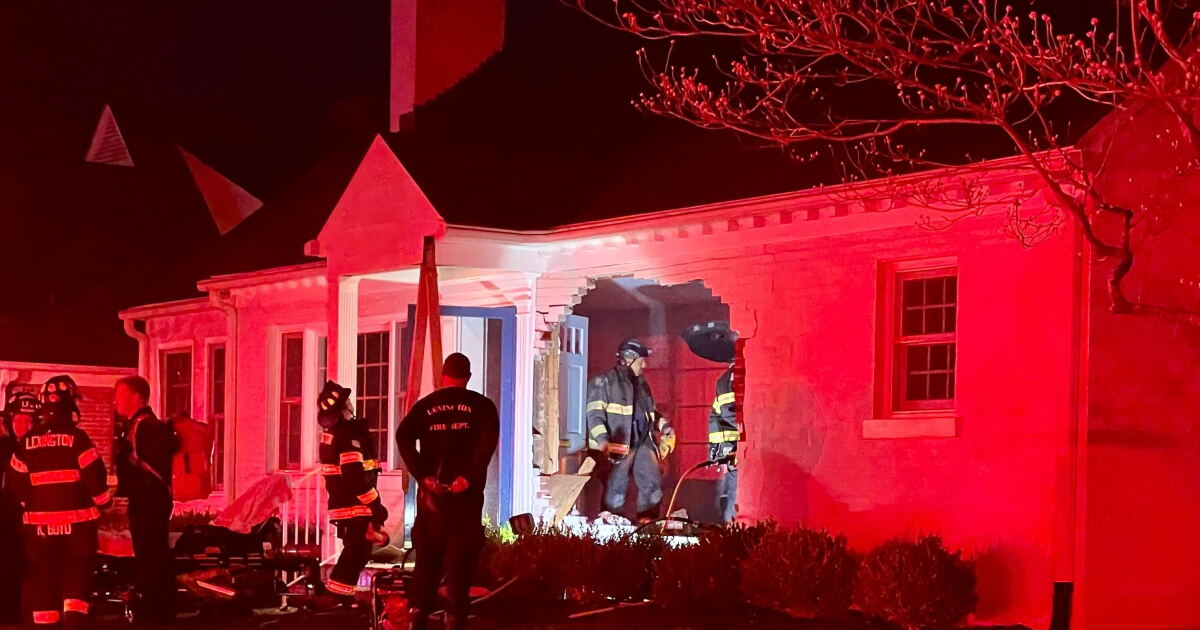 1 person with minor injuries after car drives into Lexington home