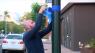 Community members tie ribbons around the city to honor fallen detective