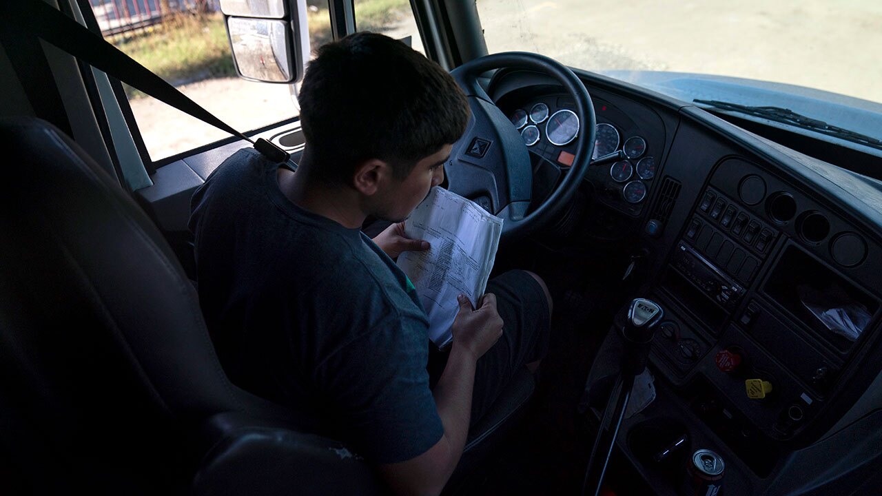 Student driver Edgar Lopez, 23, prepares for a practice driving session at California Truck Driving Academy in Inglewood, Calif., Monday, Nov. 15, 2021. 
