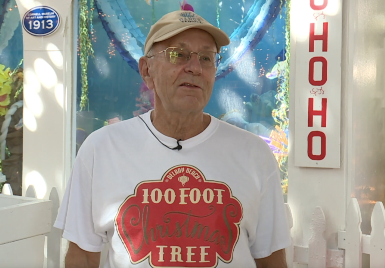 Volunteer Jeff Maul vintage toy train display Delray Christmas tree 11282023